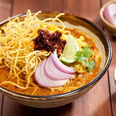  Khao Soi: Uma Sinfonia Picante de Noodles e Curry Cremoso que Explode em seu Paladar!